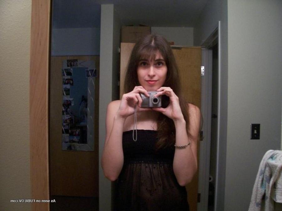 9P Chick playing with the camera for her Facebook account