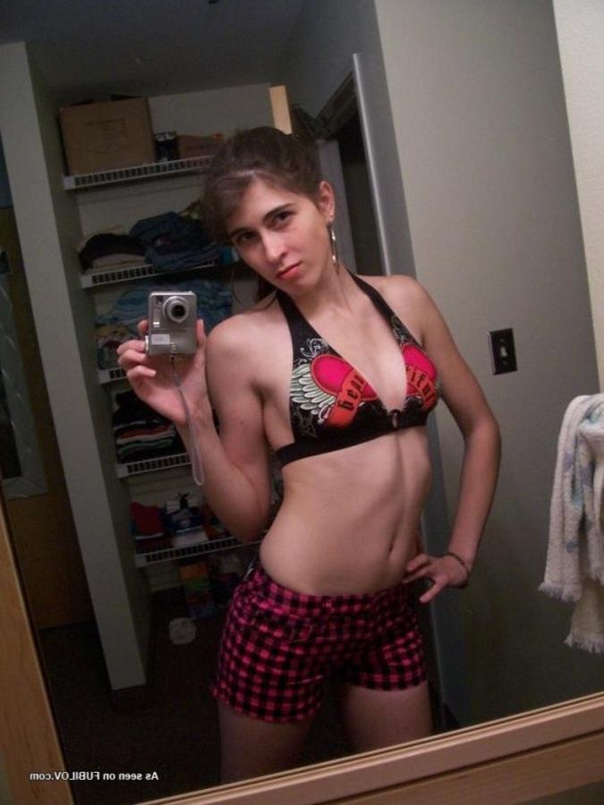 9P Chick playing with the camera for her Facebook account