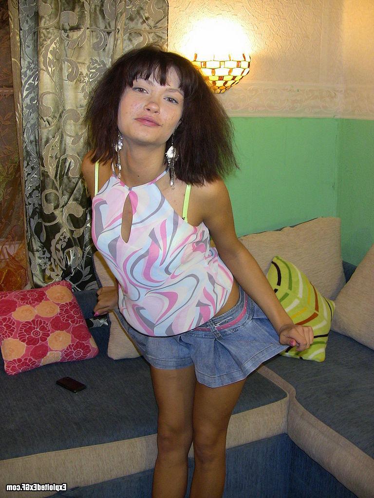 15P Horny amateur chick showing her tiny tits