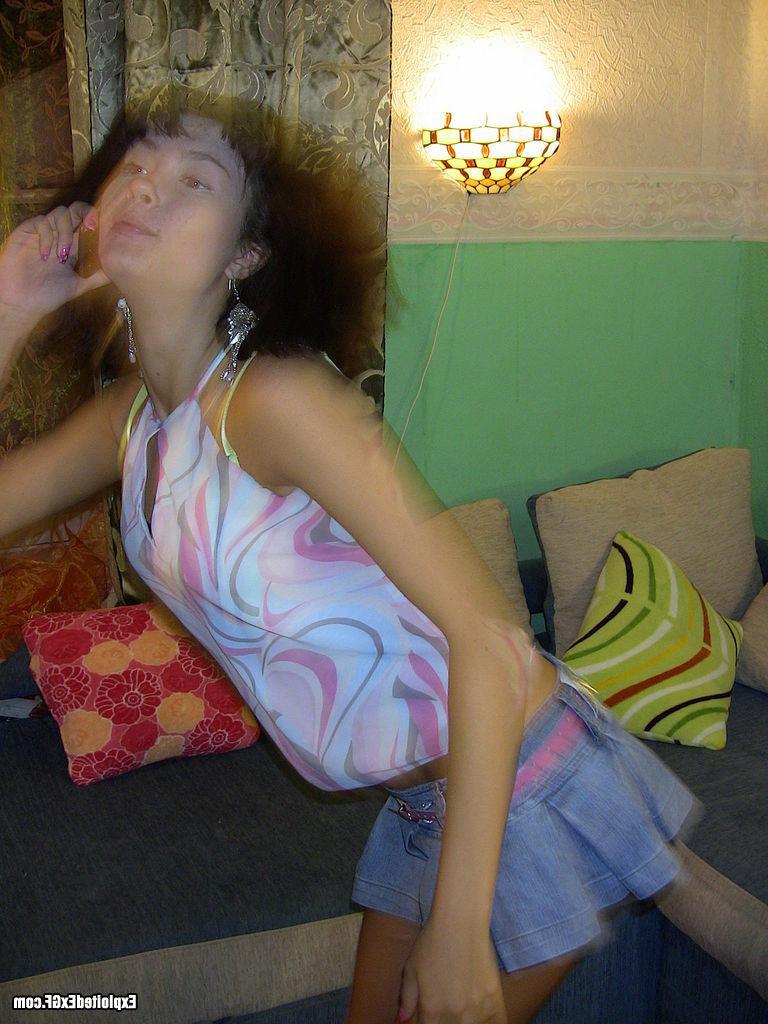 15P Horny amateur chick showing her tiny tits