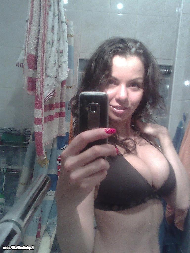 15P Sexy amateur chick shooting her self in bathroom