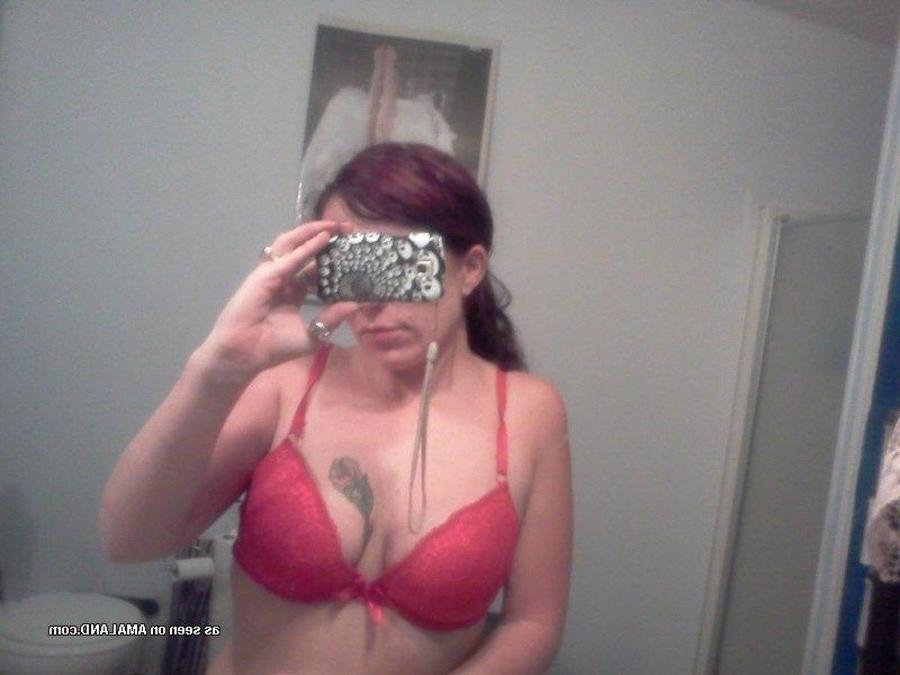 12P Tattooed chick self-shooting in front of the mirror