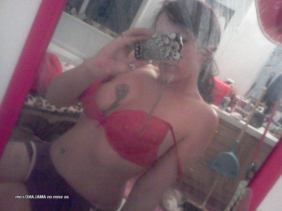 12P Tattooed chick self-shooting in front of the mirror