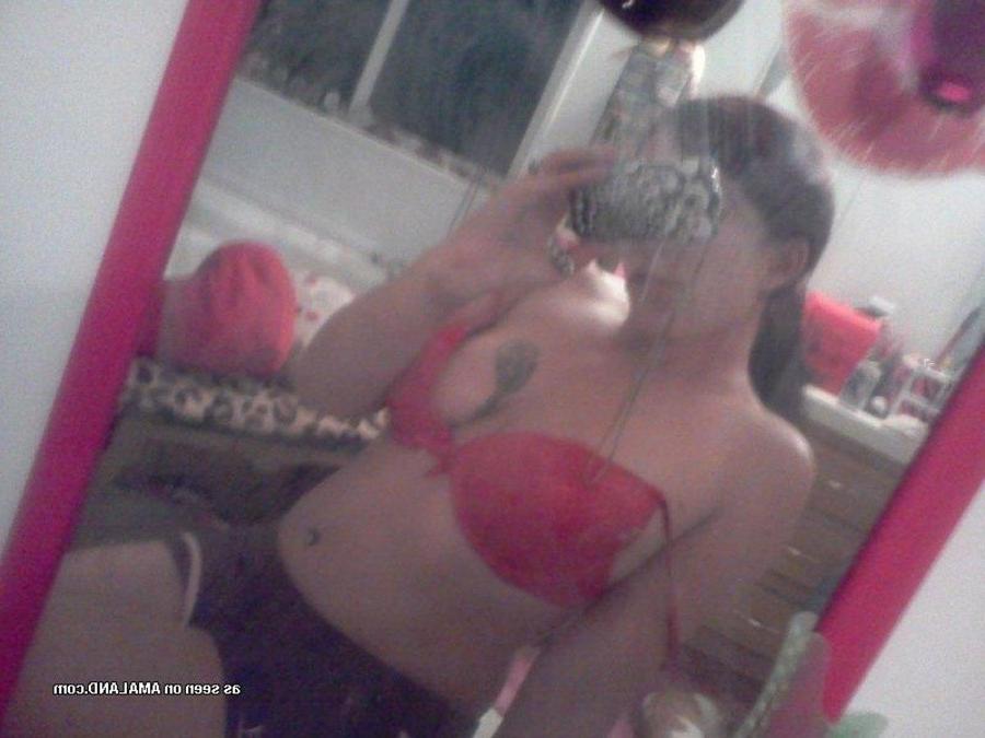 12P Tattooed chick self-shooting in front of the mirror