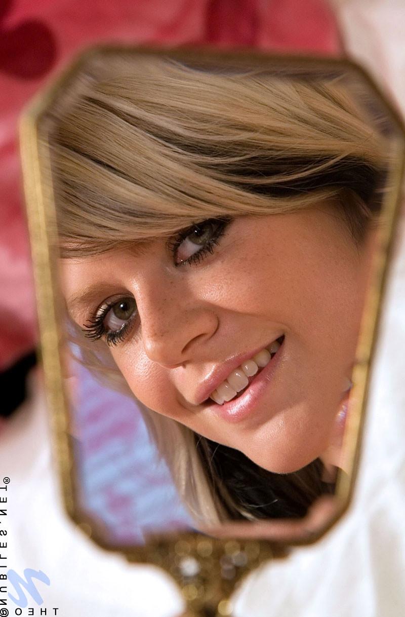 10P Blonde teen watches herself in the mirror as she plays with her breasts