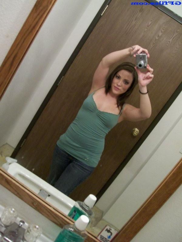 16P Naughty pics secretly taken in the bathroom mirror by an amateur brunette ex gir