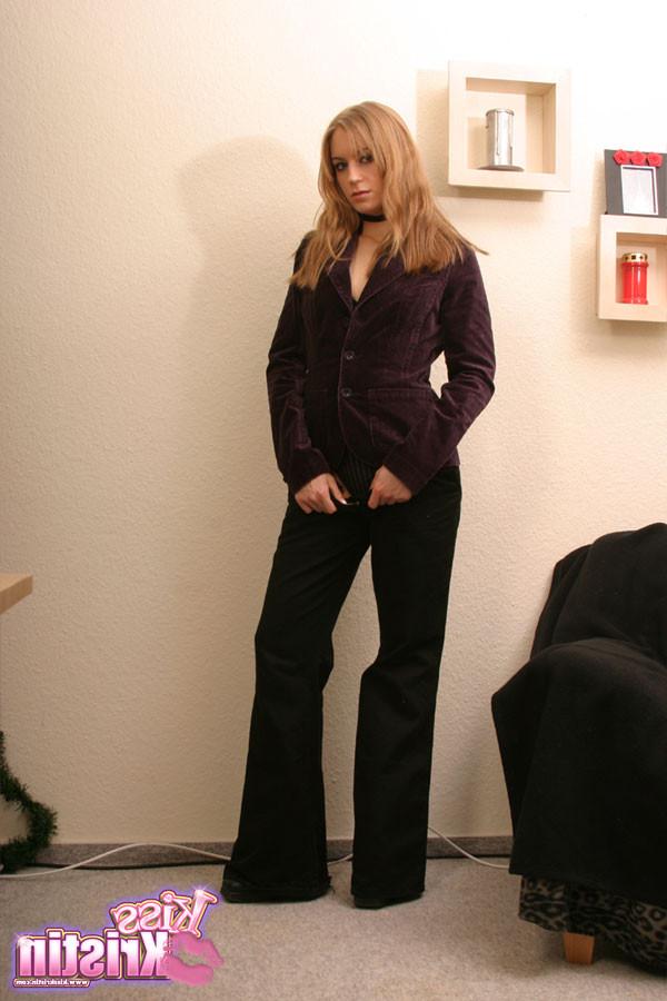 12P Kristin wearing a purple jacket and a tiny black thong