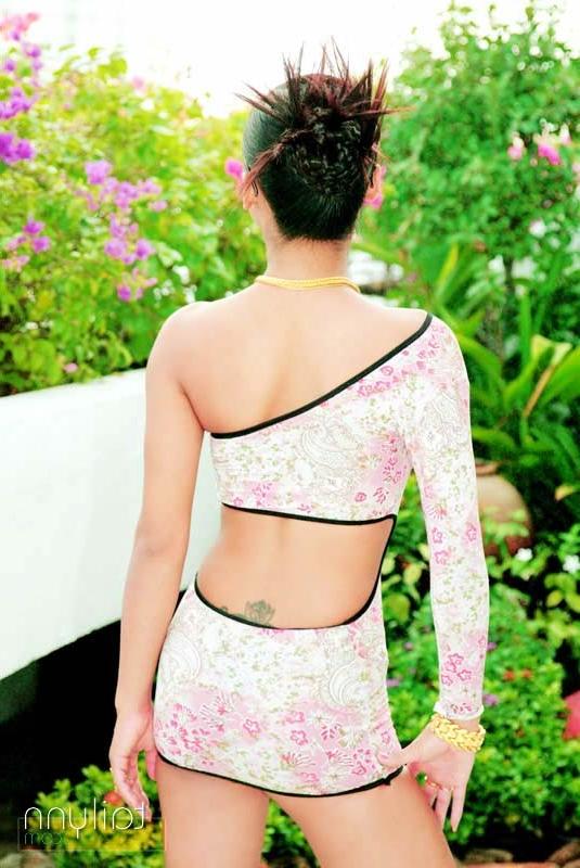 15P Glamour Thai model Tailynn poses outdoors