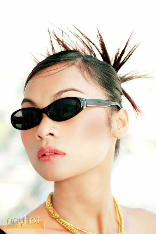 15P Glamour Thai model Tailynn poses outdoors