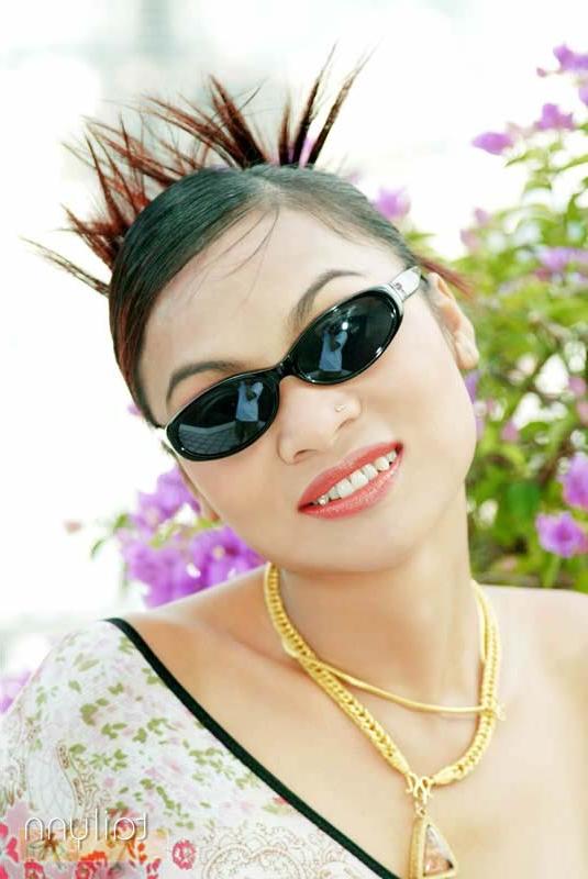 15P Glamour Thai model Tailynn poses outdoors