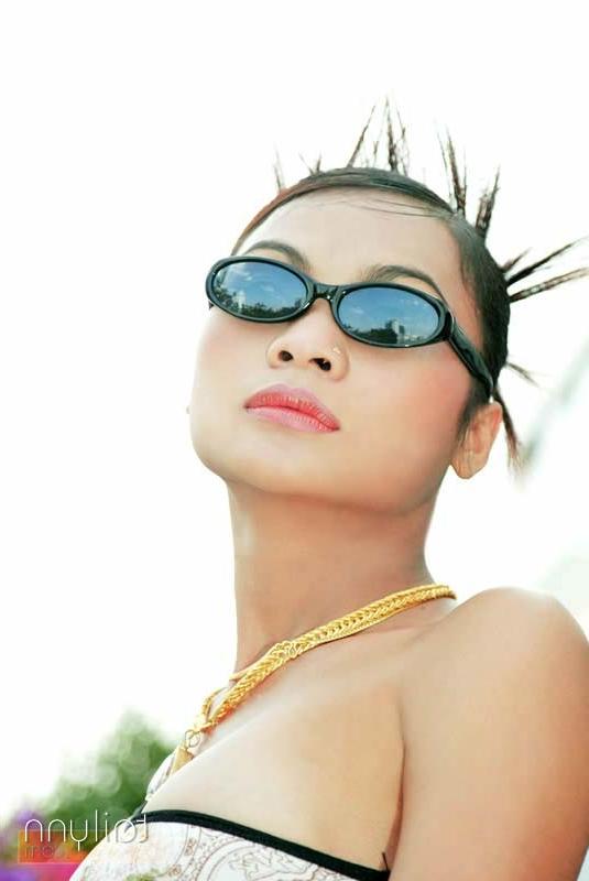 15P Glamour Thai model Tailynn poses outdoors