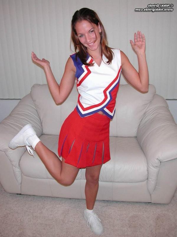 15P Nikki strips from a hot cheerleader uniform