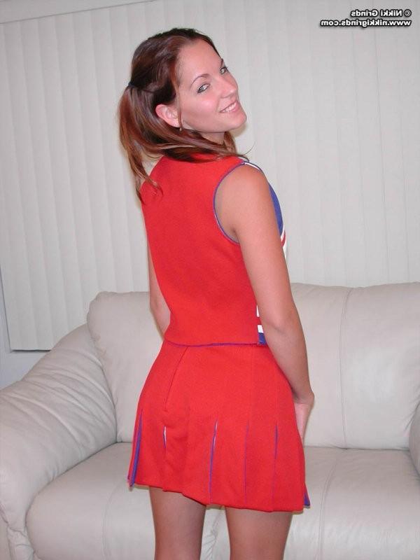 15P Nikki strips from a hot cheerleader uniform