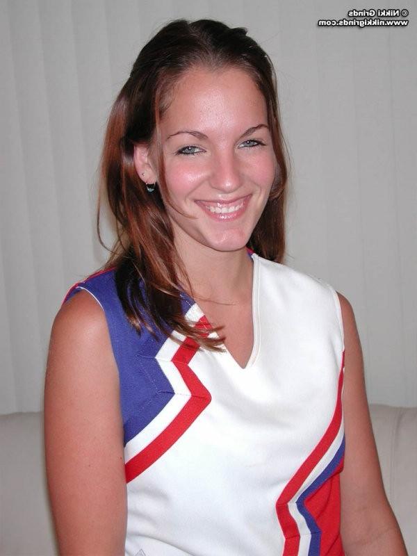 15P Nikki strips from a hot cheerleader uniform