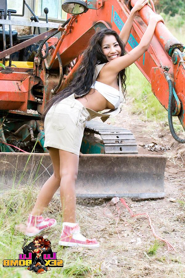 15P Incredible Asian girl Lulu gets naked outdoors