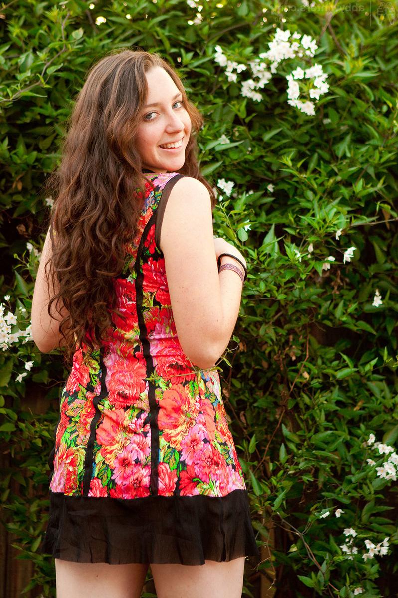 15P Natural curvy hairy amateur Evette strip teasing outdoors on patio