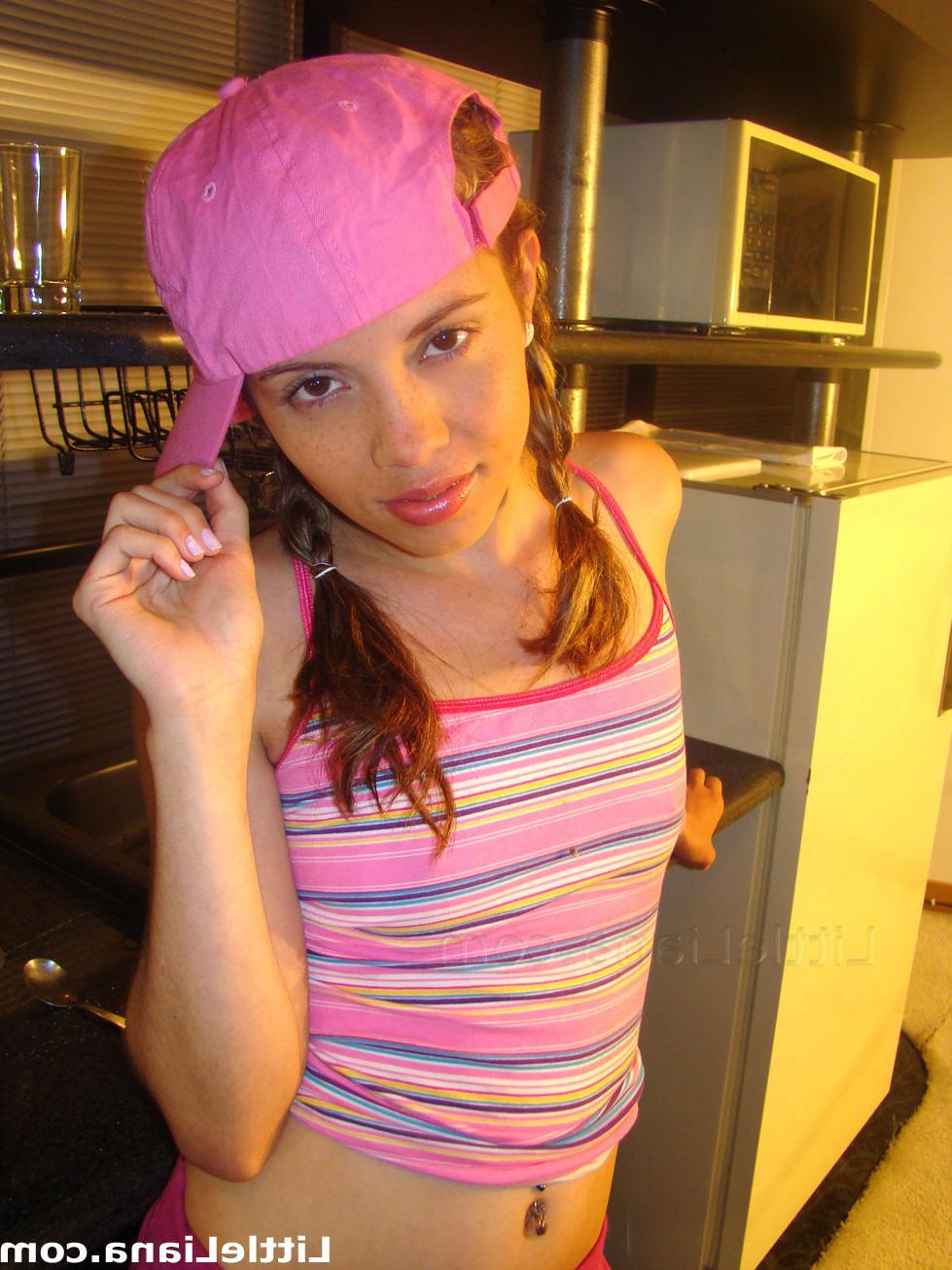 12P Cute young thing takes pictures in front of mirror with her own cam