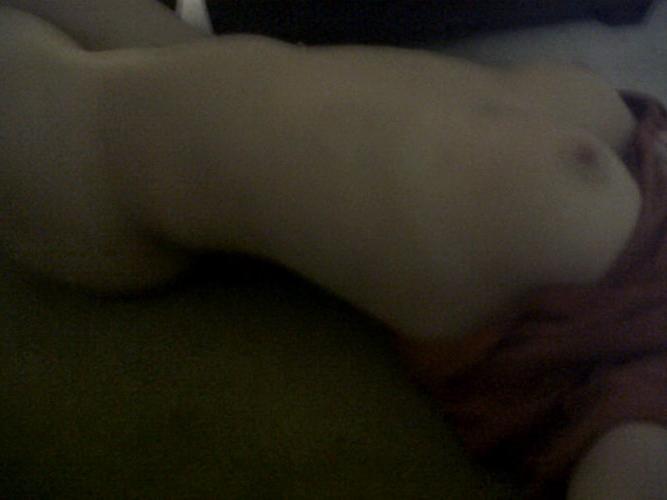 10P Amateur blonde girl taking pics her tits of herself in the bathroom