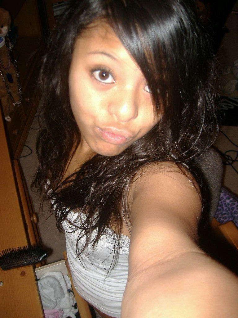 16P Cute Asian cheerleader doing sexy poses