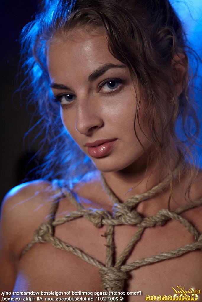 21P Sexy curly petite babe in ropes