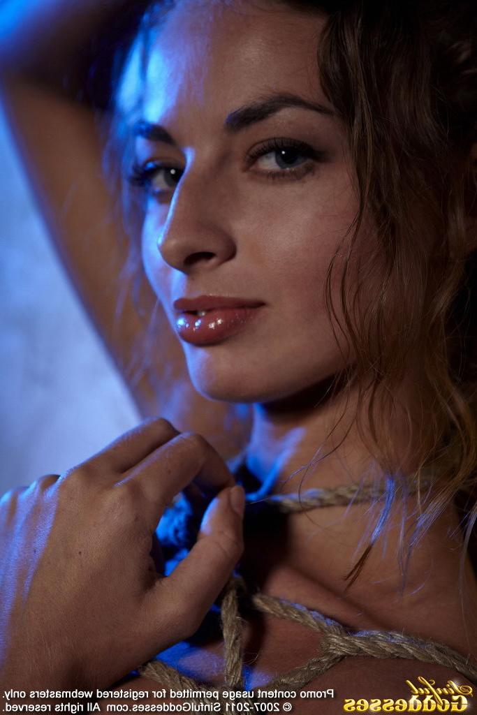 21P Sexy curly petite babe in ropes