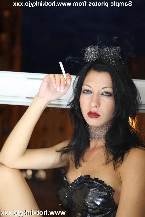 15P HotKinkyJo smokes a cigarette by the window with her anus totally prolapsed