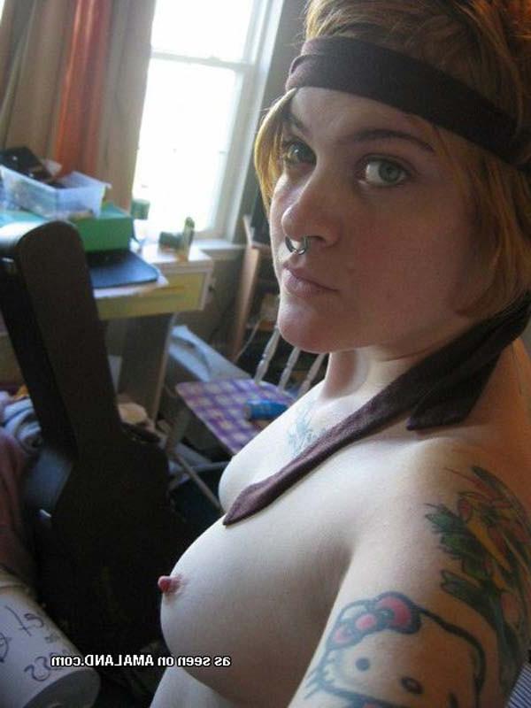 12P Tattooed Emo red haired babe at home