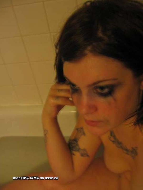 12P Tattooed Emo red haired babe at home