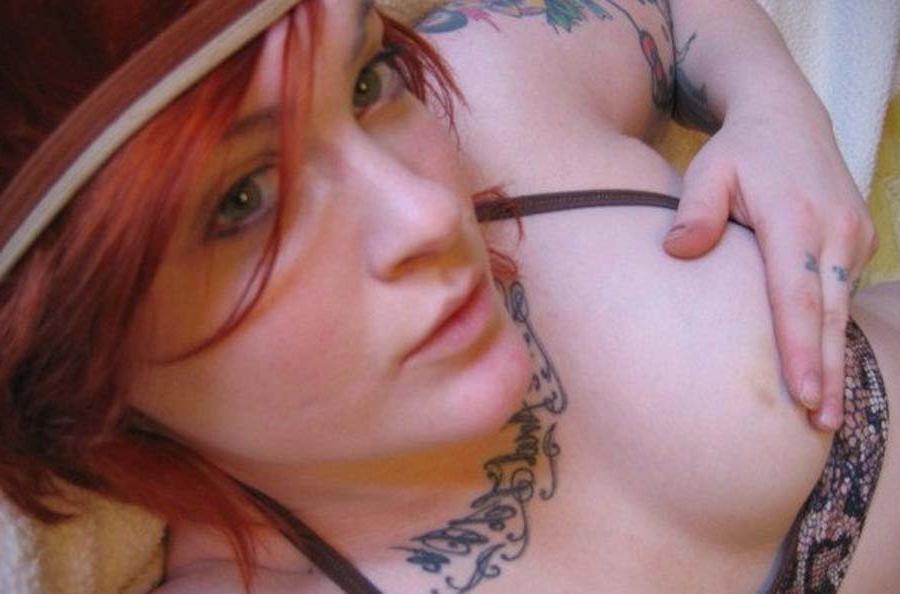 12P Tattooed Emo red haired babe at home