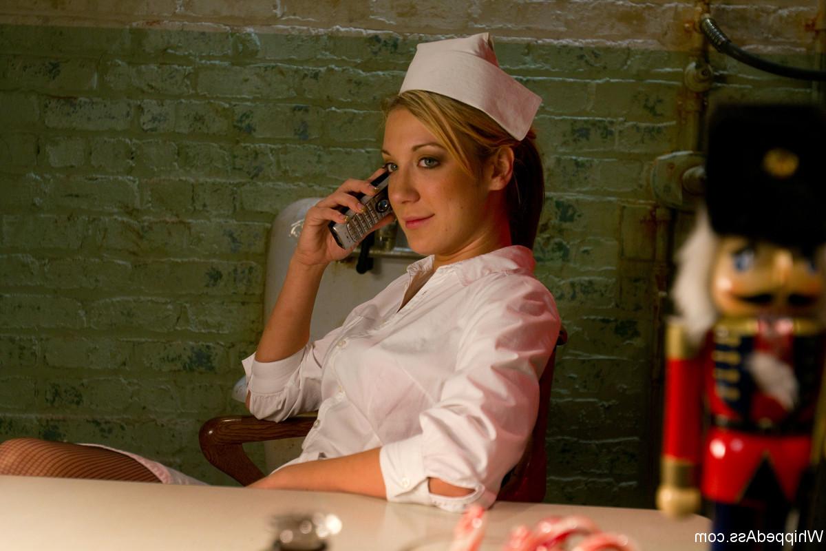 20P Sexy hard bodied nurse is tied up, subjected to lesbian punishment then pounded 
