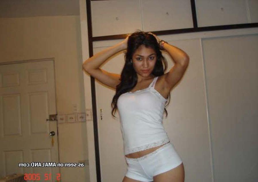 12P Curly haired Asian babe looking cute