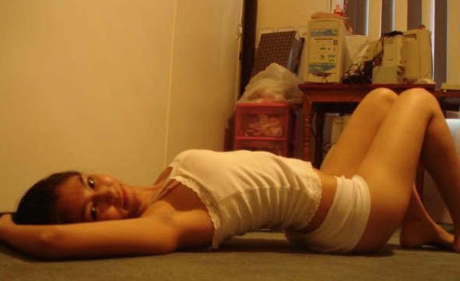 12P Curly haired Asian babe looking cute