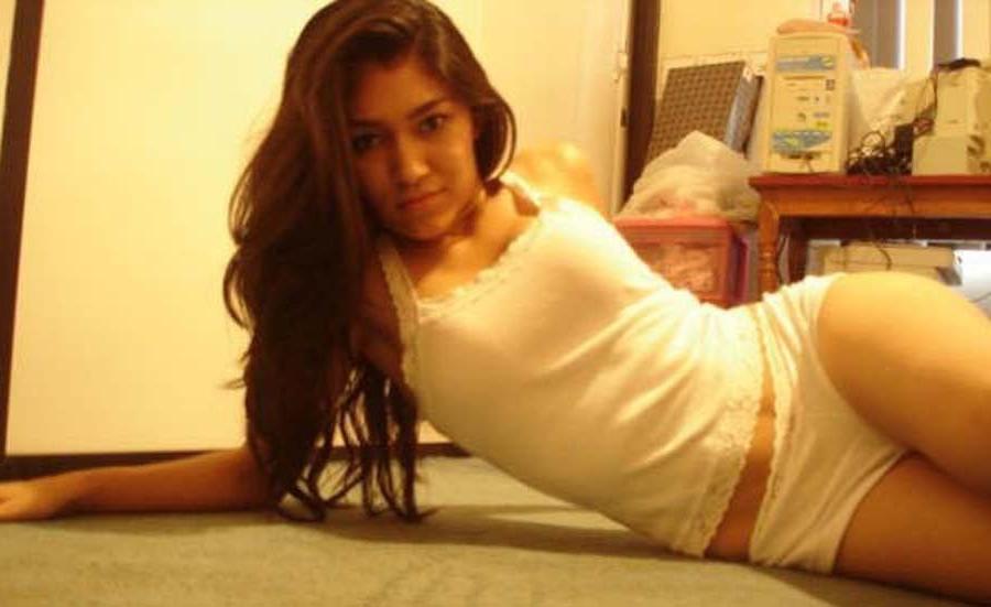 12P Curly haired Asian babe looking cute