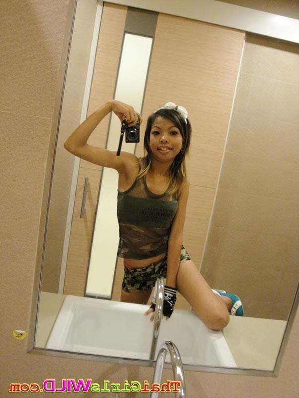 16P Slender cutie from Bangkok sips pop from a straw and takes pics
