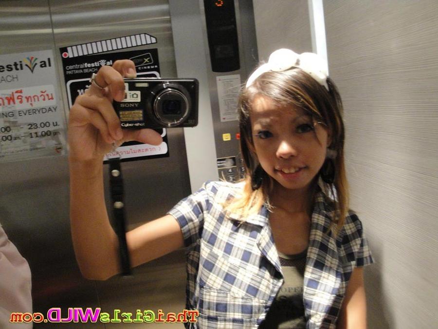 16P Slender cutie from Bangkok sips pop from a straw and takes pics
