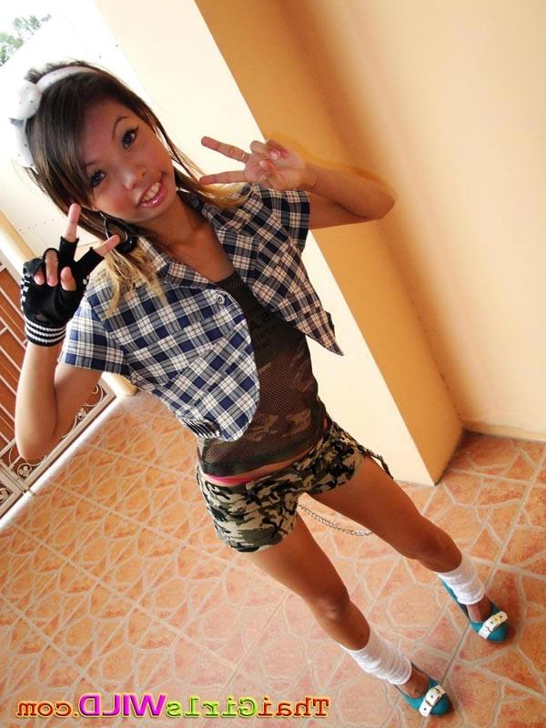 16P Slender cutie from Bangkok sips pop from a straw and takes pics