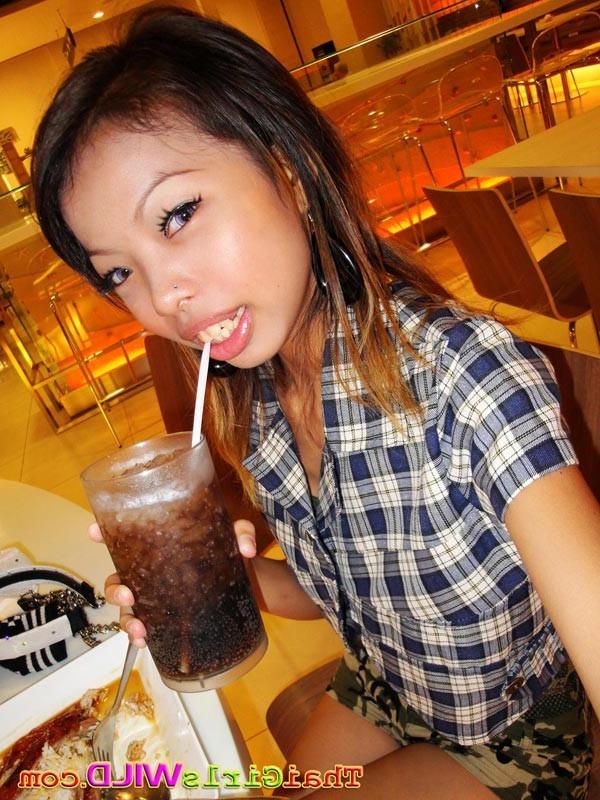 16P Slender cutie from Bangkok sips pop from a straw and takes pics