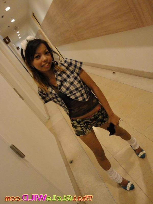 16P Slender cutie from Bangkok sips pop from a straw and takes pics