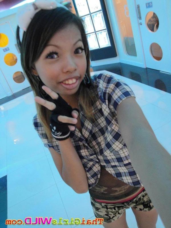 16P Slender cutie from Bangkok sips pop from a straw and takes pics