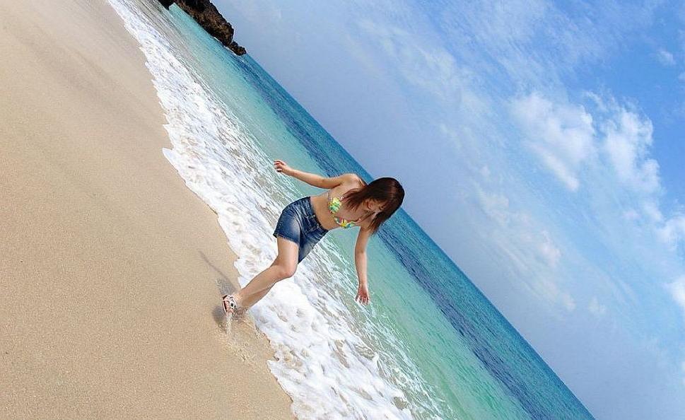 15P Chikaho Ito asian cutie poses in bikini on a beach