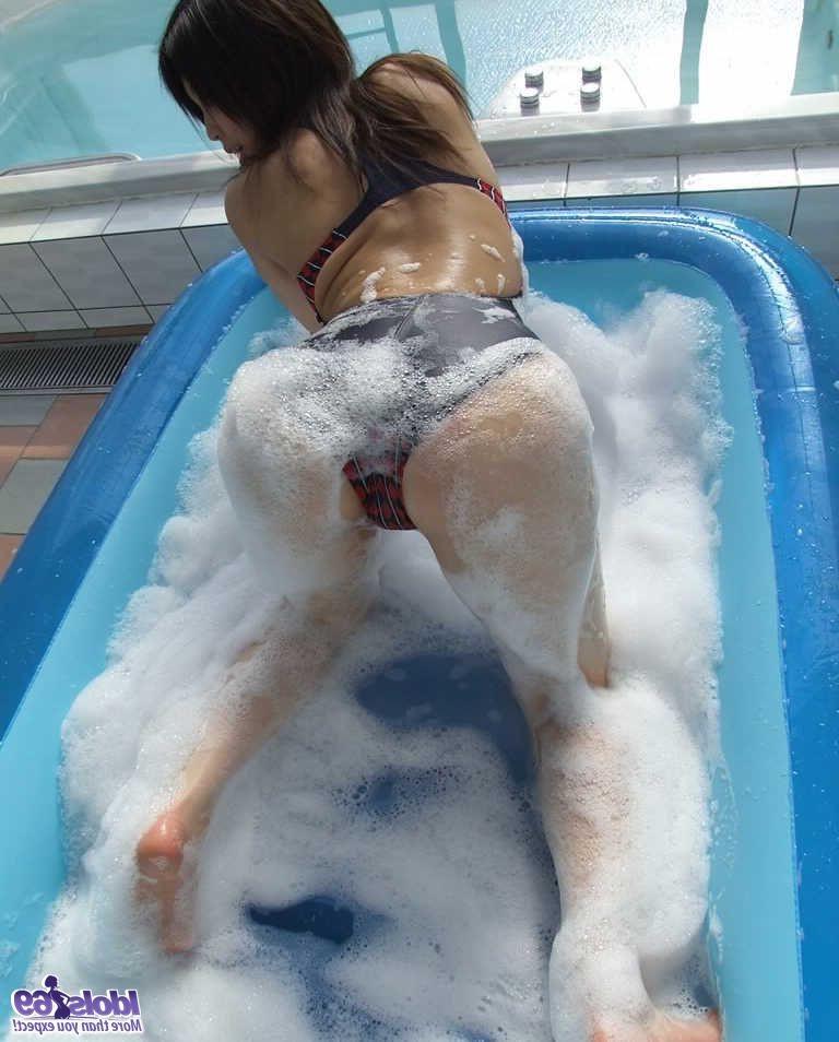 16P Hot Asian cock tease in a bathing suit in tub