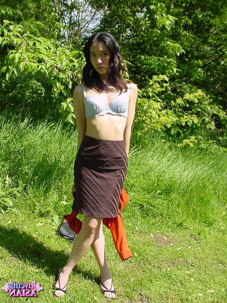16P Long haired asian beauty shows her round tits