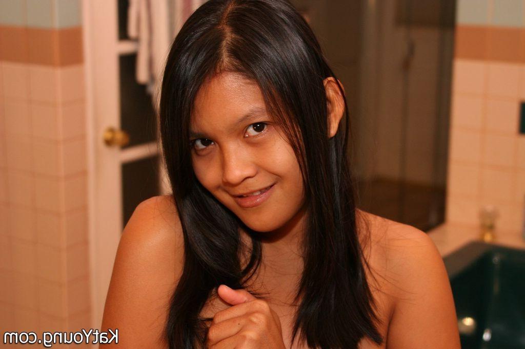16P Kat Young :: Petite asian teen with shaved pussy stripping in bathroom