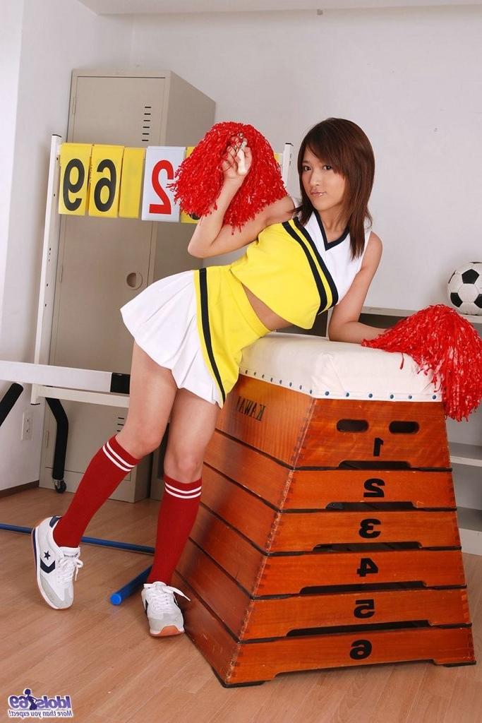 15P Busty Japanese cheerlader in red socks showing her hairy pussy