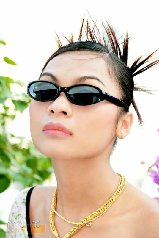 15P Glamour Thai model Tailynn shows off her spikey hair