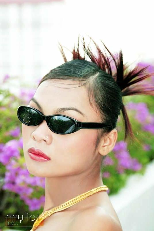 15P Glamour Thai model Tailynn shows off her spikey hair