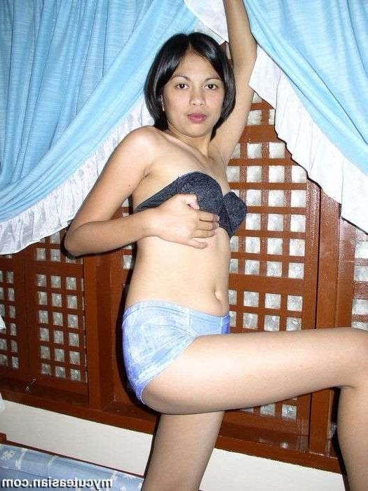 16P Thin asian teen shows her tight shaved pussy