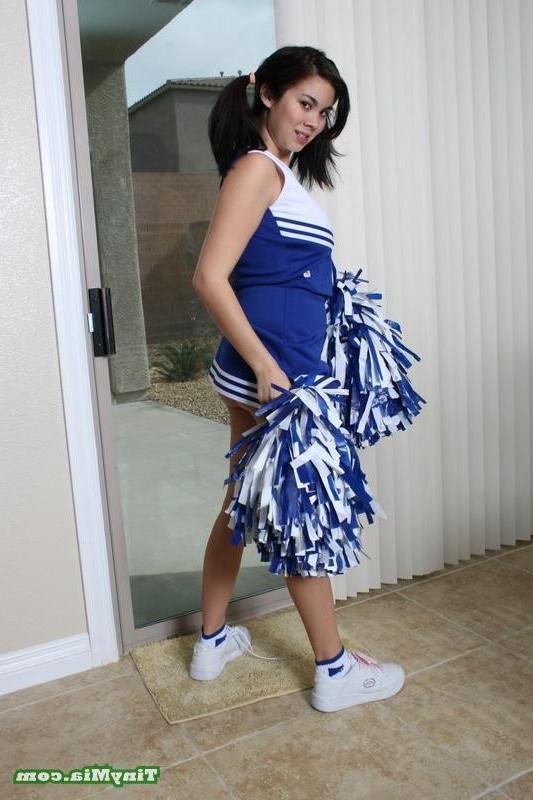 17P Asian Tiny Mia shows her cheerleader outfit and tits