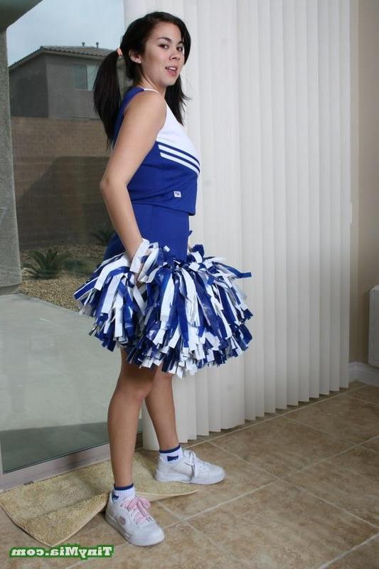 17P Asian Tiny Mia shows off her cheerleader outfit