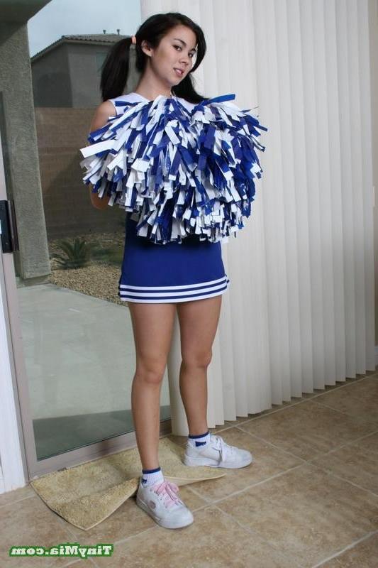 17P Asian Tiny Mia shows off her cheerleader outfit